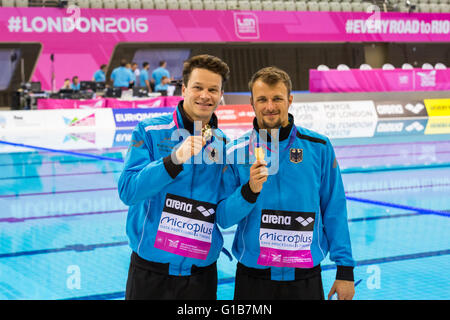 Aquatics Centre, Olympic Park, London, UK. 12th May 2016. The German 'Dream Team' and 2013 World Champions. German divers Sascha Klein and  Patrick Hausding pose with their gold medals, the British team of Tom Daley and Daniel Goodfellow win silver in the Diving Men’s 10m Synchro Final Credit:  Imageplotter News and Sports/Alamy Live News Stock Photo