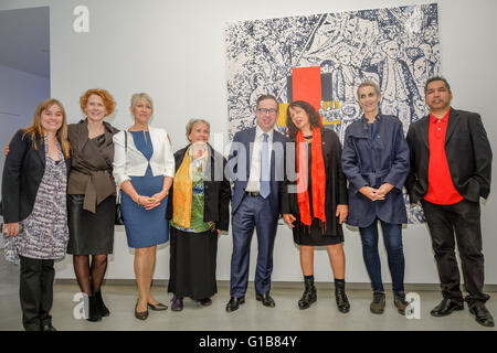 Sydney, Australia. 13th May, 2016. (L-R) Natasha Bullock, Elizabeth Ann Macgregor OBE, Leanne Bennett, Joyce Watson, Chief Executive Officer of Qantas Group, Alan Joyce, Judy Watson, Susan Norrie and Vernon Ah Kee pose for a photograph next to the artwork by the late Gordon Bennett (1955-2014), Possession Island (Abstraction), 1991 part of the Museum of Contemporary Art Australia (MCA), Qantas and Tate Joint Acquisition Program for contemporary Australian art. Credit:  Hugh Peterswald/Pacific Press/Alamy Live News Stock Photo