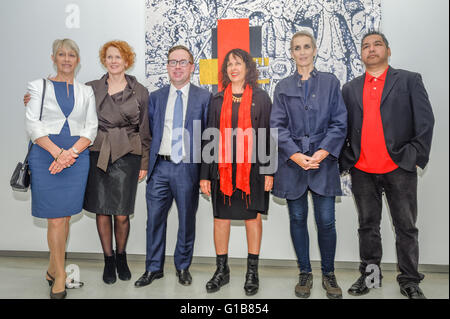 Sydney, Australia. 13th May, 2016. (L-R) Leanne Bennett, Natasha Bullock, Elizabeth Ann Macgregor OBE, Chief Executive Officer of Qantas Group, Alan Joyce, Judy Watson, Susan Norrie and Vernon Ah Kee pose for a photograph next to the artwork by the late Gordon Bennett (1955-2014), Possession Island (Abstraction), 1991 part of the Museum of Contemporary Art Australia (MCA), Qantas and Tate Joint Acquisition Program for contemporary Australian art. Credit:  Hugh Peterswald/Pacific Press/Alamy Live News Stock Photo