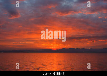 Sunset over the Garda lake from point of Sirmione town in Italy Stock Photo