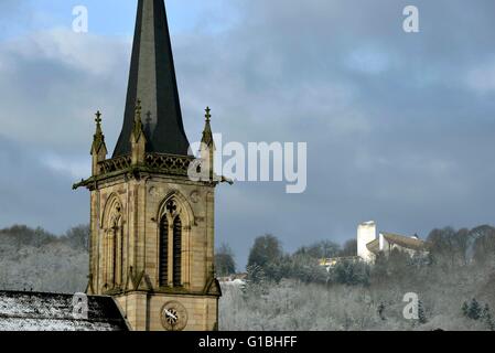 France, Haute Saone, Ronchamp, village, church, tower, hill and Notre Dame du Haut chapel Stock Photo