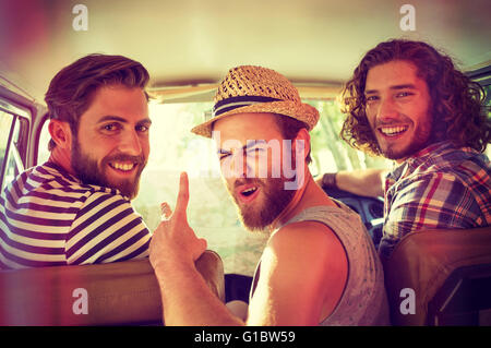 Hipster friends on road trip Stock Photo