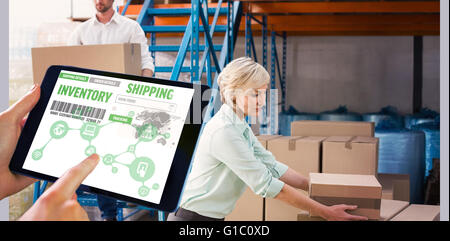 Composite image of man using tablet pc Stock Photo