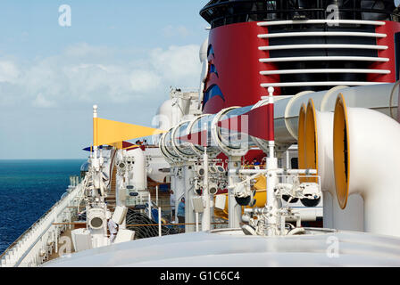 Nassau, BahamasMarch 23, 2016 - Looking rearward aboard the Disney Dream cruise ship with a smokestack and the raised AquaDuck ride visible alongside. Stock Photo