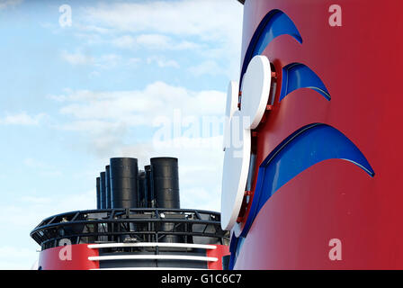 Close-up image of the smokestack of the Disney Dream cruise ship and logo during a cruise between the U.S. and The Bahamas. Stock Photo