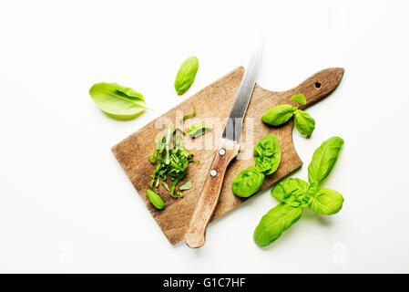 Fresh basil leaves on white background close up. Stock Photo
