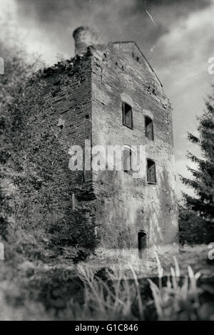 Abandoned haunted house in grunge style Stock Photo