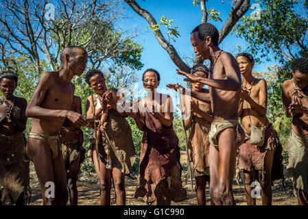 Traditional dancing and singing in the Living Museum of the Ju’Hoansi-San, Grashoek, Namibia Stock Photo