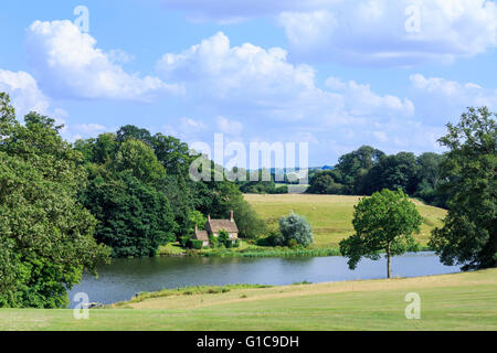 Lakeside cottage orné in Bowood House park and grounds designed by Capability Brown, Calne, Wiltshire Stock Photo