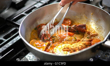 Cooking pasta with lobster in an Italian restaurant. Stock Photo