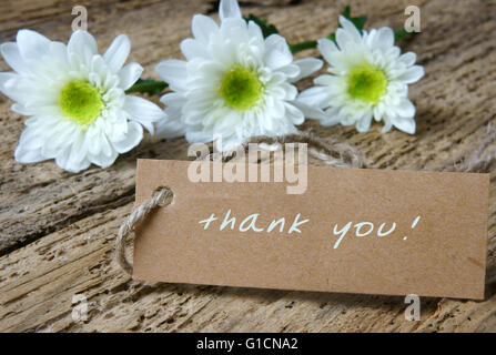 Thank you background, writting on paper, on abstract wooden background, can use on valentine day, mother day or celebrate love day Stock Photo