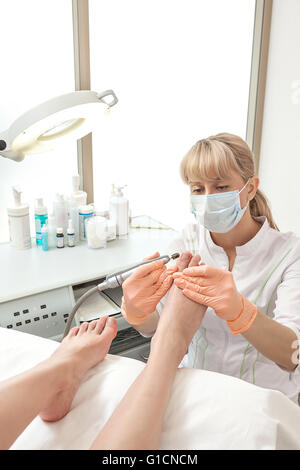 Pedicure in a Day Spa, feet nails Stock Photo