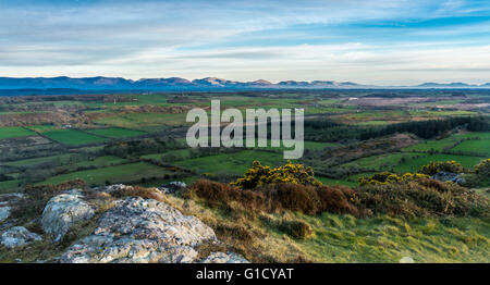 The mountains of Snowdonia from Mynydd Bodafon on Anglesey Stock Photo