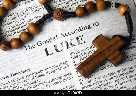 Holy Bible and rosary. The Gospel According to Luke.  France. Stock Photo