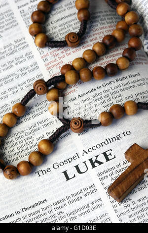 Holy Bible and rosary.  The Gospel According to Luke.  France. Stock Photo