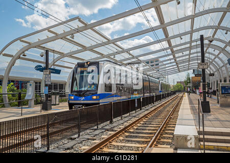 Charlotte, North Carolina - A train at an uptown station of LYNX Charlotte, the city's light rail system. Stock Photo