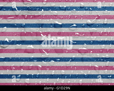 water drops on blue, white, pink striped metallic surface Stock Photo