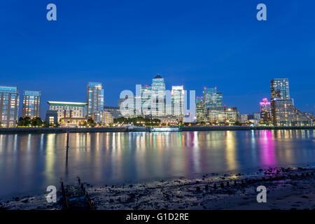 Canary Wharf skyline with the landmark corporate office buildings at night Stock Photo