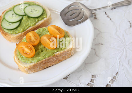 Green sourdough open face sandwiches toast Stock Photo