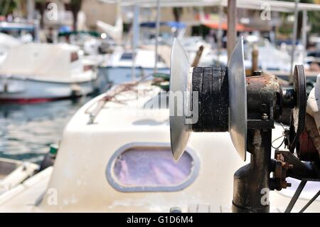 Detail of fishing cable drum on a trawler boat Stock Photo