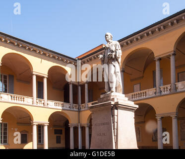 Pavia, Italy - March 8, 2015: Statue of Alessandro Volta in the courtyard of the University. The well-preserved statue is illumi Stock Photo