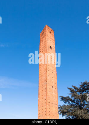 Pavia, Italy - March 8, 2015: Medieval towers in the historic center of the city. Especially the red brick used for the construc Stock Photo