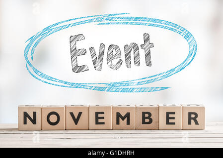 November event sign with wooden blocks on a stage Stock Photo