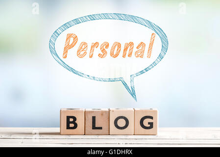 Personal blog sign on a table with a sketch talk bubble Stock Photo