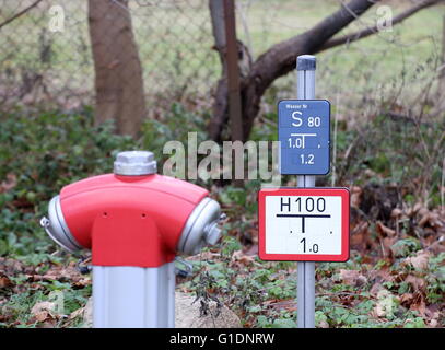 Fire hydrant with sign in Germany. Stock Photo