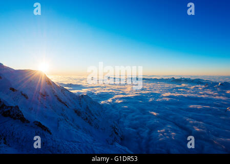 Europe, France, Haute Savoie, Rhone Alps, Chamonix, sea of clouds weather inversion over Chamonix valley, sunset Stock Photo
