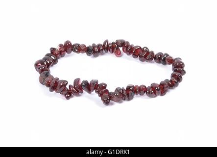 Splintered garnet chain on white background Stock Photo