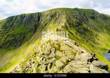 Looking along Striding Edge towards Helvellyn in the Lake District Stock Photo