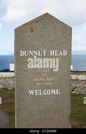 Dunnet head sign and lighthouse Stock Photo