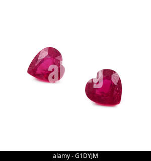 Natural heart shaped rubies on a white background. Stock Photo