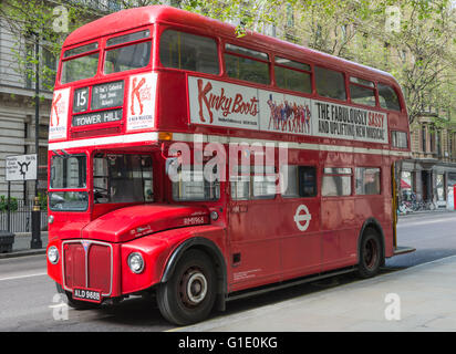 Traditional London red Routemaster bus parked on a London street before starting its journey from Trafalgar Square to Tower Hill Stock Photo
