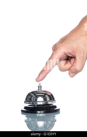 Service bell with human hand on white background,  customer demand, reflection Stock Photo