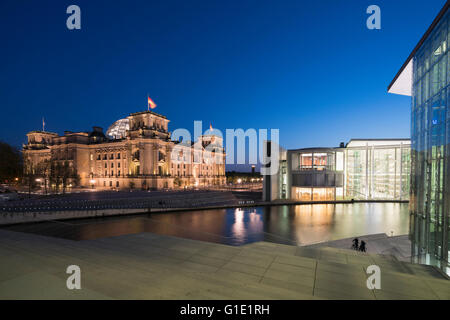 Night view of The Reichstag parliament building ,Paul Lobe Haus and Marie Elisabeth Luders ( Lueders) Haus government buildings Stock Photo