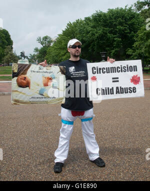 Washington DC, USA. 13th May, 2016.   Bloodstained Men and their friends, a group that opposes male circumcision, protests at the White House. Credit:  Patsy Lynch/Alamy Live News Stock Photo