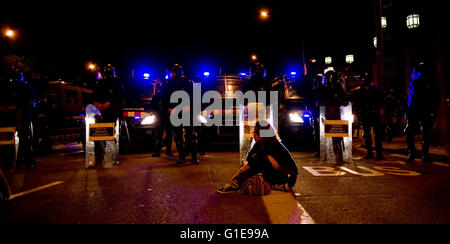 Barcelona, Catalonia, Spain. 20th July, 2011. File Image - Young woman sitting in front a police cordon in Barcelona during a indignados protest. © Jordi Boixareu/ZUMA Wire/Alamy Live News Stock Photo
