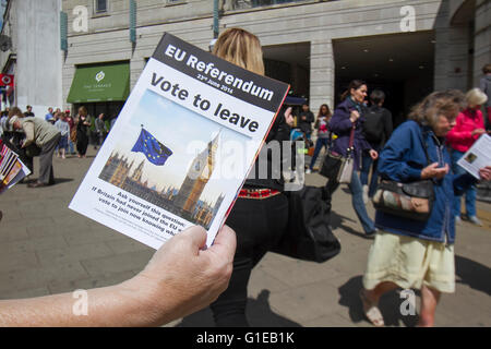 Wimbledon London,UK. 14th May 2016. Vote Leave and Grassroots volunteers distribute leaflets in Wimbledon town centre to members of the public in a  campaign for votes  with six weeks remaining until the EU Referendum on 23 June when British voters go to the polls to decide whether to remain or leave the European Unio Credit:  amer ghazzal/Alamy Live News Stock Photo