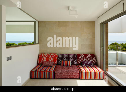 White House, L'Ametlla. View of futons and cushions next to the patio area. Stock Photo