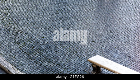 cobblestone is the typical roman paving also known as Sampietrino Stock Photo