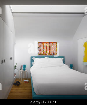 Modern Family home, Shepherds Bush, London. Bedroom with modern furniture and colourful accents. Stock Photo