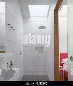 Modern Family home, Shepherds Bush, London. Modern bathroom with shower cubicle and white tiling. Stock Photo