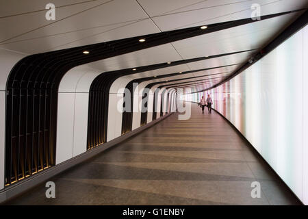 A pedestrian tunnel features an LED integrated lightwall and links St Pancras International and King's Cross St Pancras stations Stock Photo