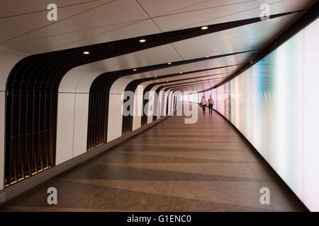 A pedestrian tunnel features an LED integrated lightwall and links St Pancras International and King's Cross St Pancras stations Stock Photo