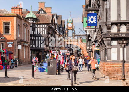 Street market in Foregate Street, with the Eastgate Clock, Chester, Cheshire, England, UK Stock Photo