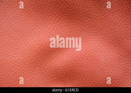 Red artificial leather texture - background Stock Photo