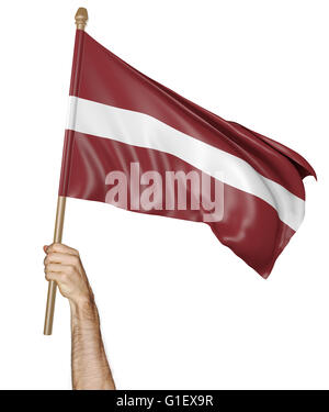 Hand proudly waving the national flag of Latvia, 3D rendering Stock Photo