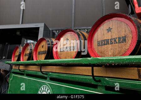 Wooden barrels with Heineken name on display at the entrance at the Heineken Museum in Amsterdam, Holland, Netherlands. Stock Photo